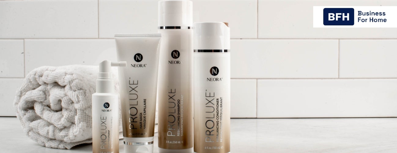 Image of the ProLuxe Hair Care System, including Scalp Treatment, Hair Mask, Conditioner and Shampoo, in a bathroom setting. 