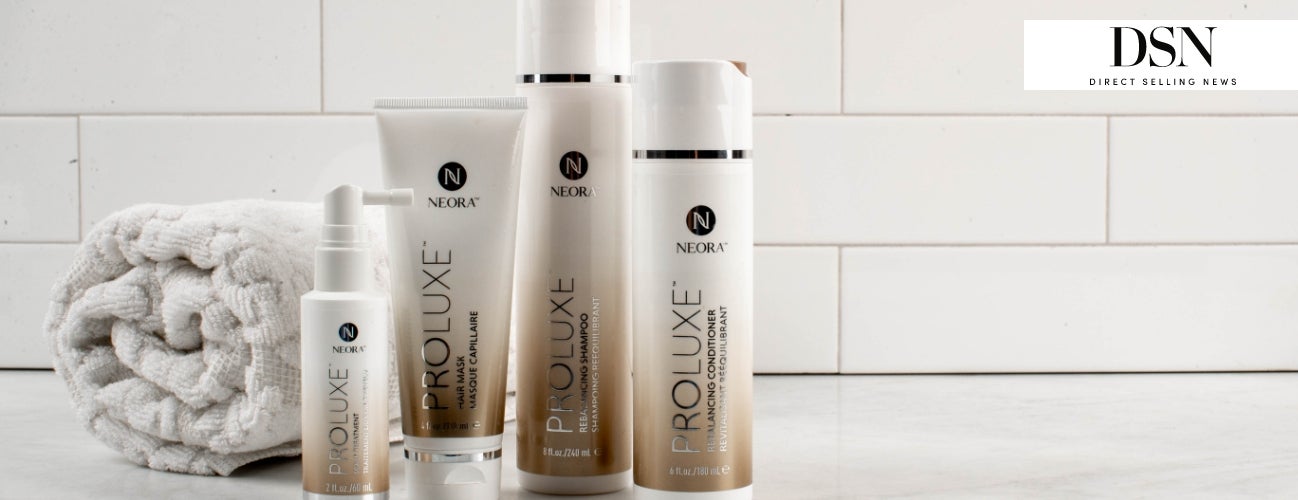 Image of the ProLuxe Hair Care System, including Scalp Treatment, Hair Mask, Conditioner and Shampoo, in a bathroom setting. 