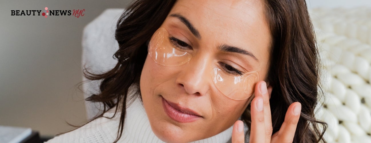 Image of a woman applying the Eye-V Moisture Boost Hydrogel Patches underneath her eyes.