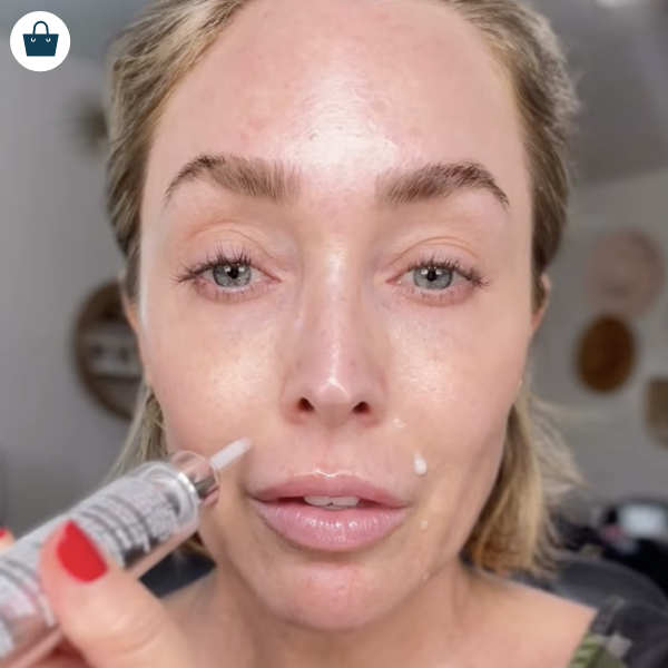 A woman applying NeoFILLER around her lips.